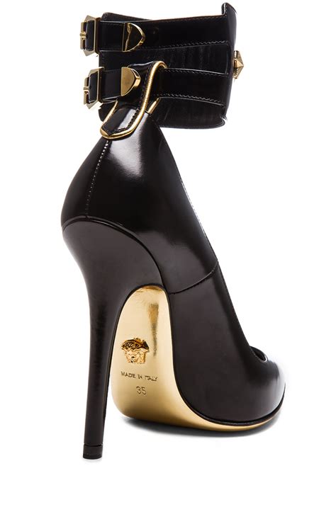 versace leather platform strappy pumps.